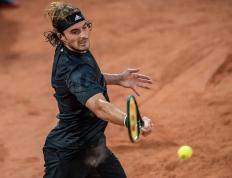 IM体育官方网-美国网球队轻取意大利网球队，西西帕斯制霸全场